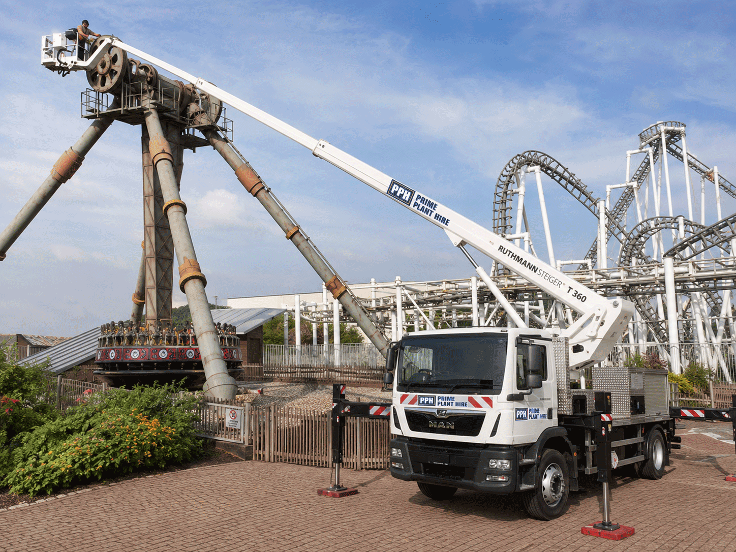 Lorry mounted cherry picker working on an events and leisure site