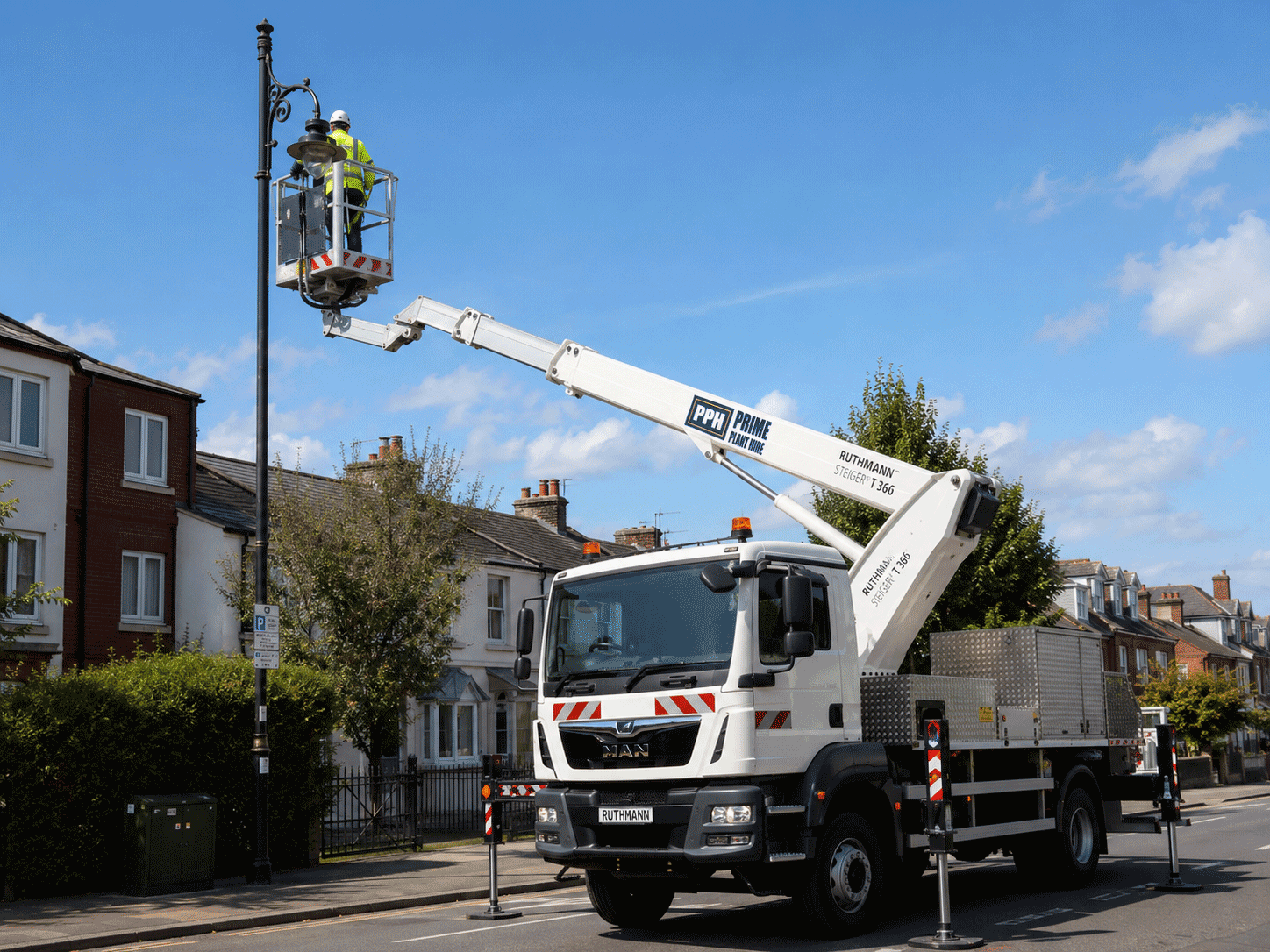 Truck mounted cherry picker used for street lighting maintenance